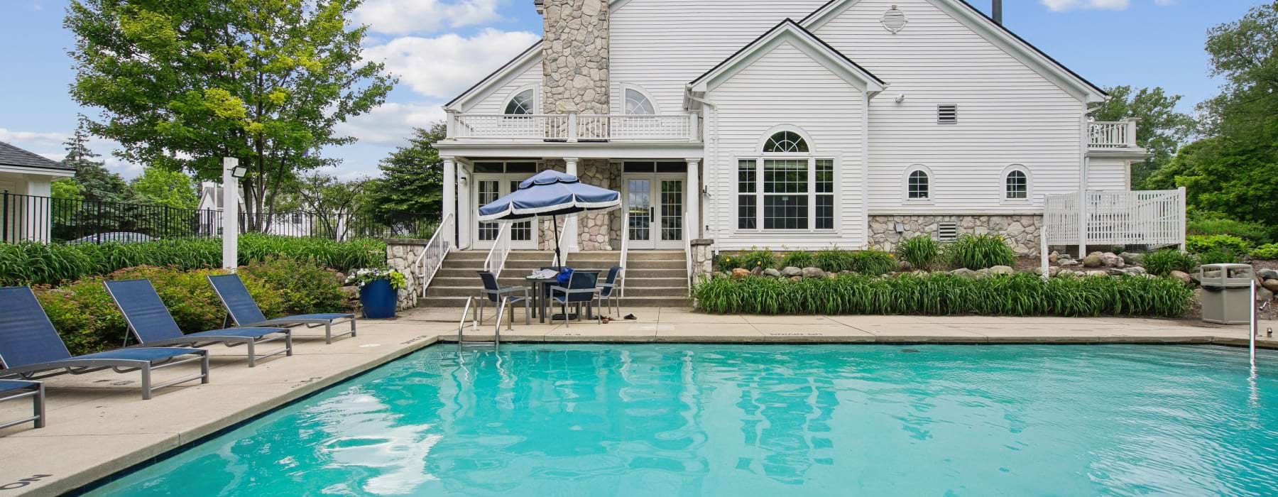 Pool deck with lounge chairs at The Graham