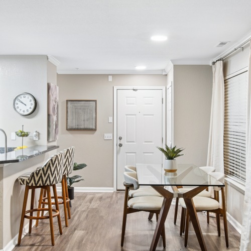 a kitchen with a dining table